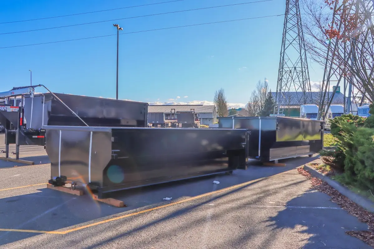 Roll-off dumpster ready for waste disposal at job site for 2 Yard Dumpster Rental in Gorham